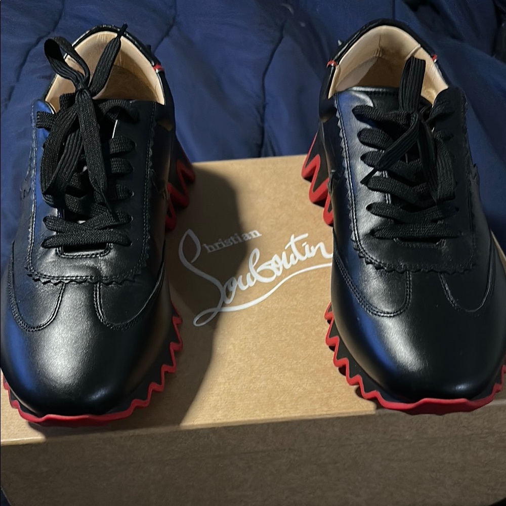 Christian Louboutin Black Sneakers with Red Soles